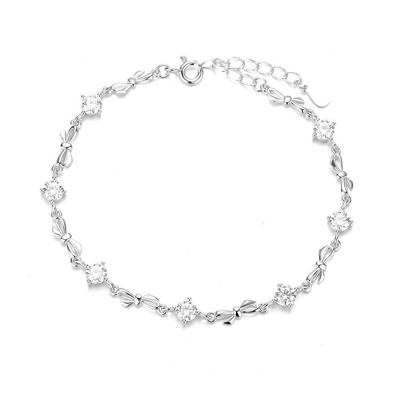 S925純銀閃耀鋯石蝴蝶結花環手鍊 白金色正面展示